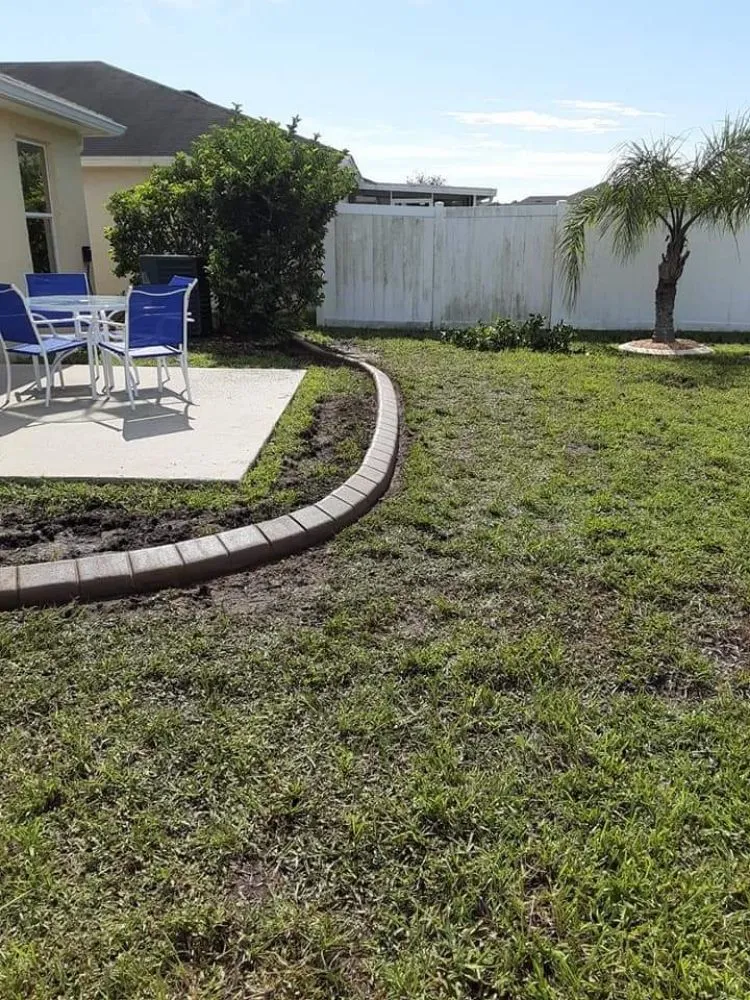 Trusted landscape design for homes in Port Orange, FL by M&M Curbing and Landscaping