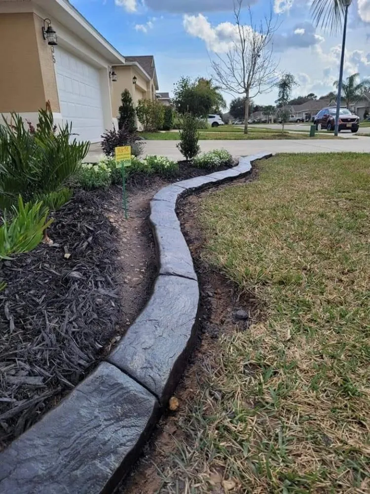 Custom yard cleanup service in Port Orange, FL by M&M Curbing and Landscaping
