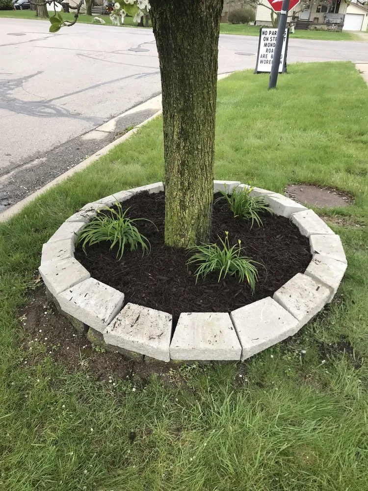 Affordable outdoor landscaping for residential properties in Newport, MI by M&M Lawn Care and Snow Removal