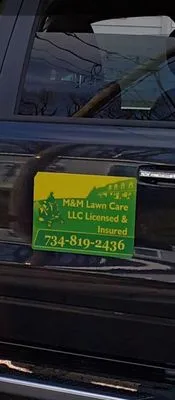 M&M Lawn Care and Snow Removal Logo