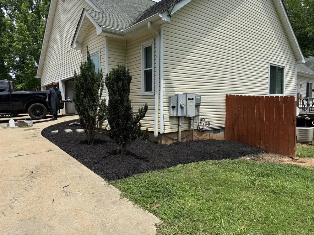 Custom outdoor landscaping for year-round maintenance in Brooks, GA by MNK In And Out Solutions
