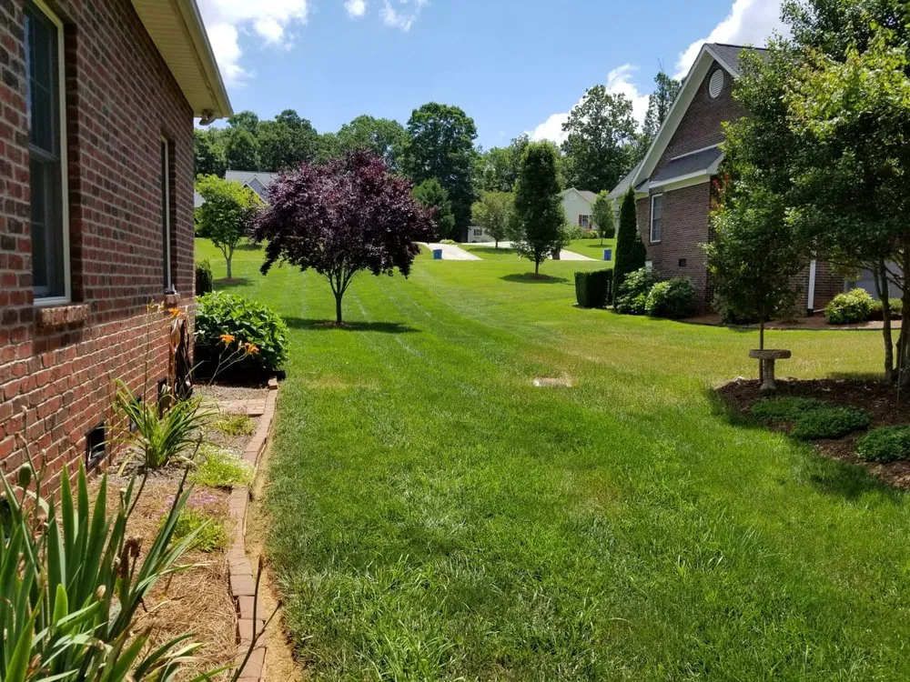 Professional lawn mowing service for homes in Taylorsville, NC by Mo Rite Lawn Services