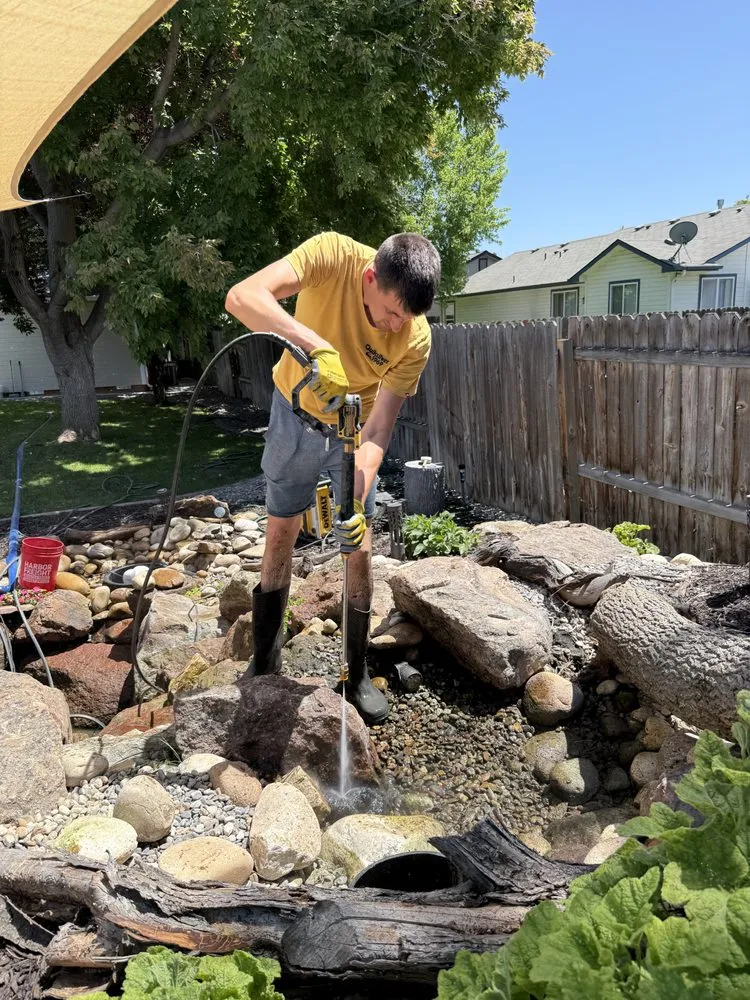 Professional yard cleanup service for homes in Boise, ID by Modern Aqua