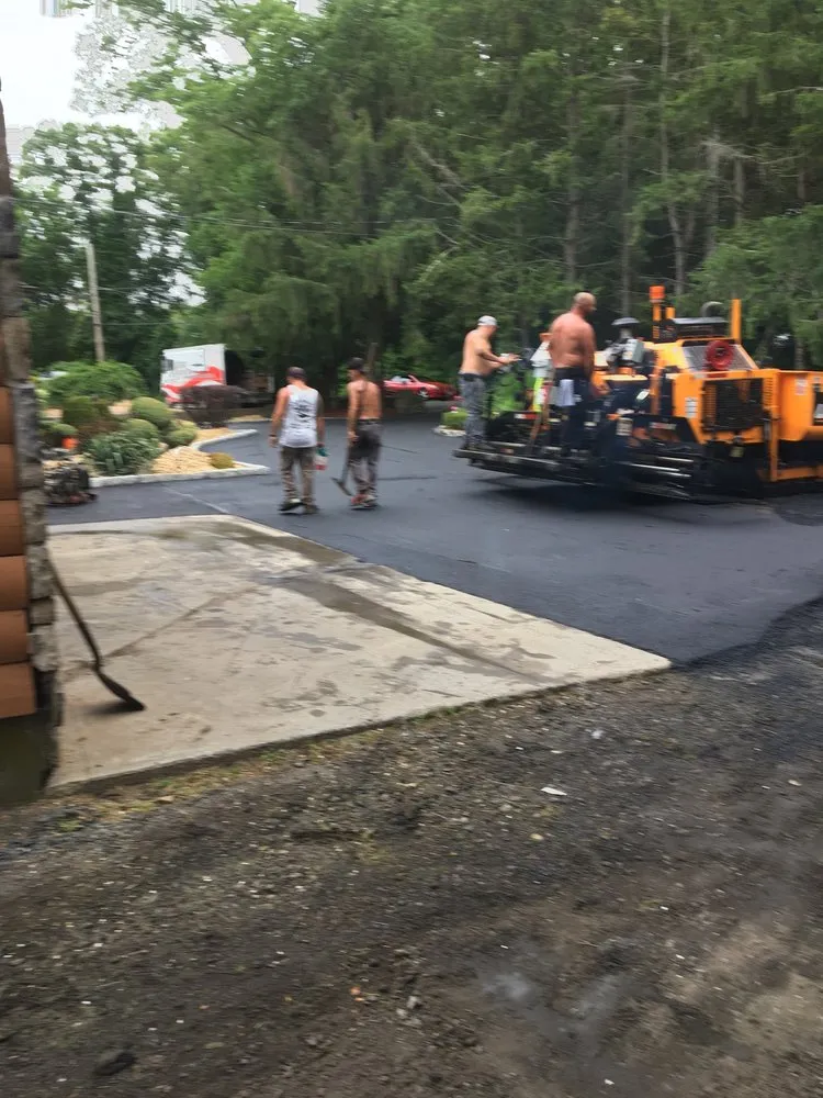 Local lawn care service with custom design across Westport, MA - Modern Landscaping