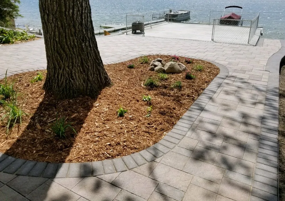 Affordable yard cleanup service for outdoor upgrades in New Lothrop, MI by Modern Transitions Landscaping