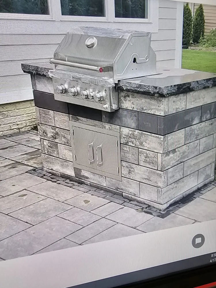 Expert yard cleanup service for year-round maintenance in New Lothrop, MI by Modern Transitions Landscaping