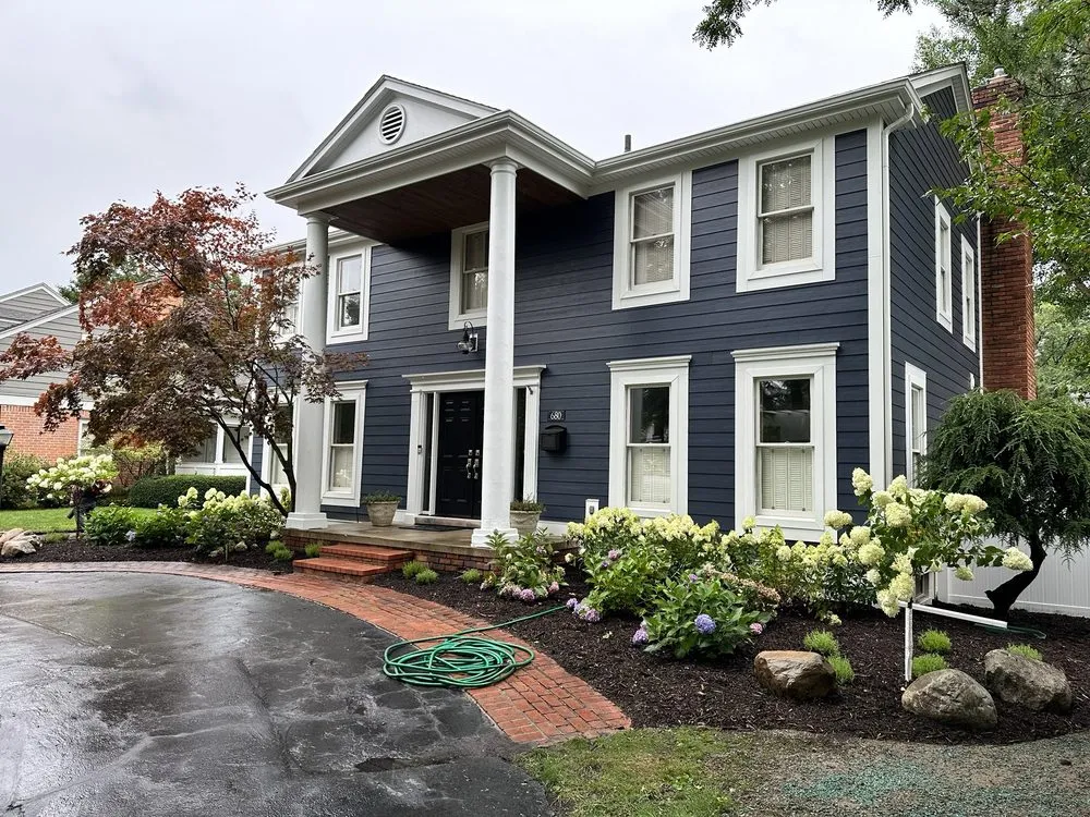 Professional yard maintenance for year-round maintenance in Birmingham, MI by Modern Tree & Landscape