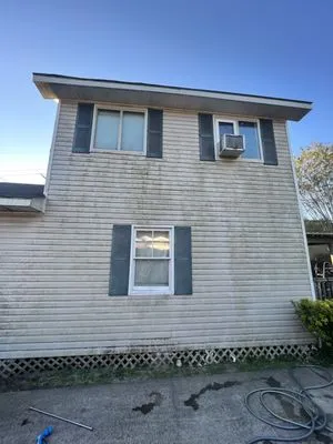 Moe Lawn & Pressure Washing Services Logo