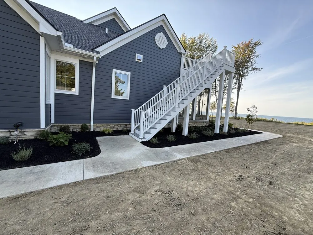 Professional lawn mowing service for year-round maintenance in Conneaut, OH by Moe’s Lakeside Landscape & Excavation