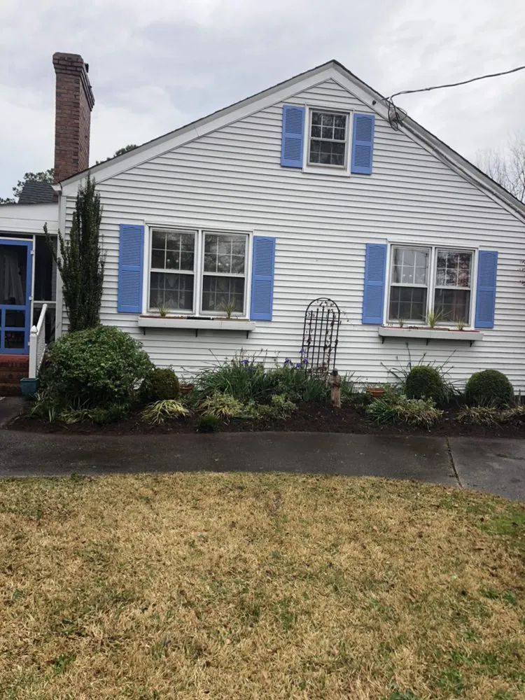 Expert lawn mowing service for residential properties in Norfolk, VA by Moe's Lawn Care