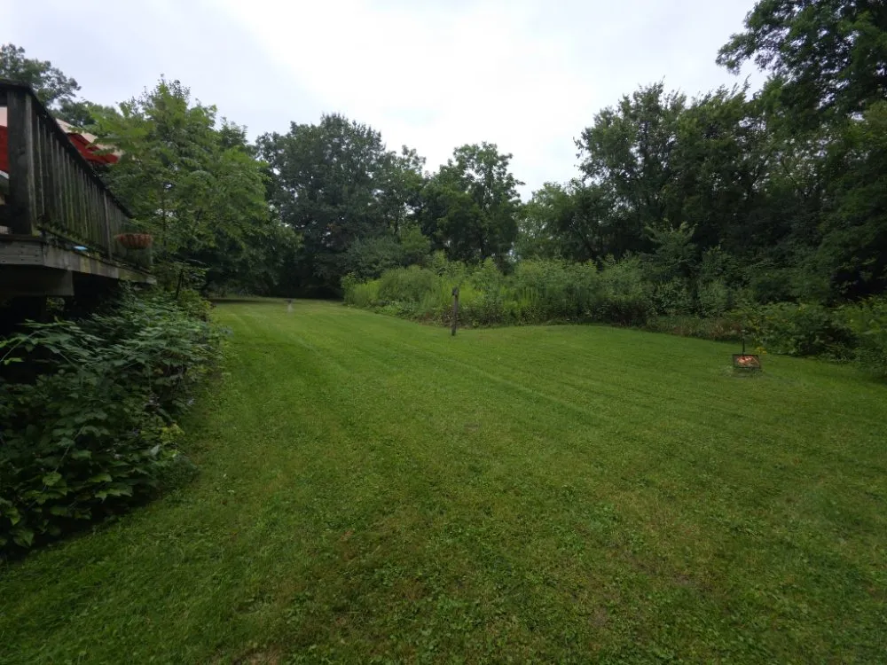 Professional landscape installation for residential properties in Spring Grove, IL by Moganzer