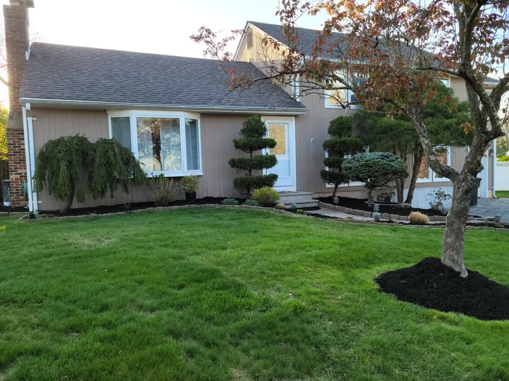 Affordable landscape design for year-round maintenance across Freehold, NJ - Mogz Lawn And Landscape
