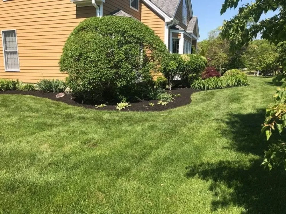 Custom outdoor landscaping for homes in Osbornville, NJ by Mogz Lawn And Landscape