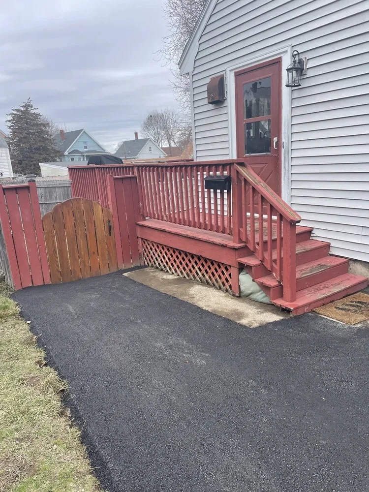 Custom lawn mowing service for homes in Lynn, MA by Moises Masonry & Landscaping