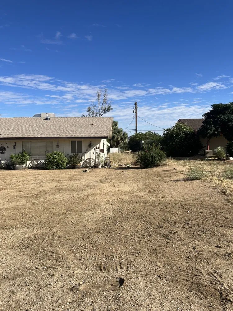 Professional lawn mowing service for residential properties in Joshua Tree, CA by Mojave Landscaping