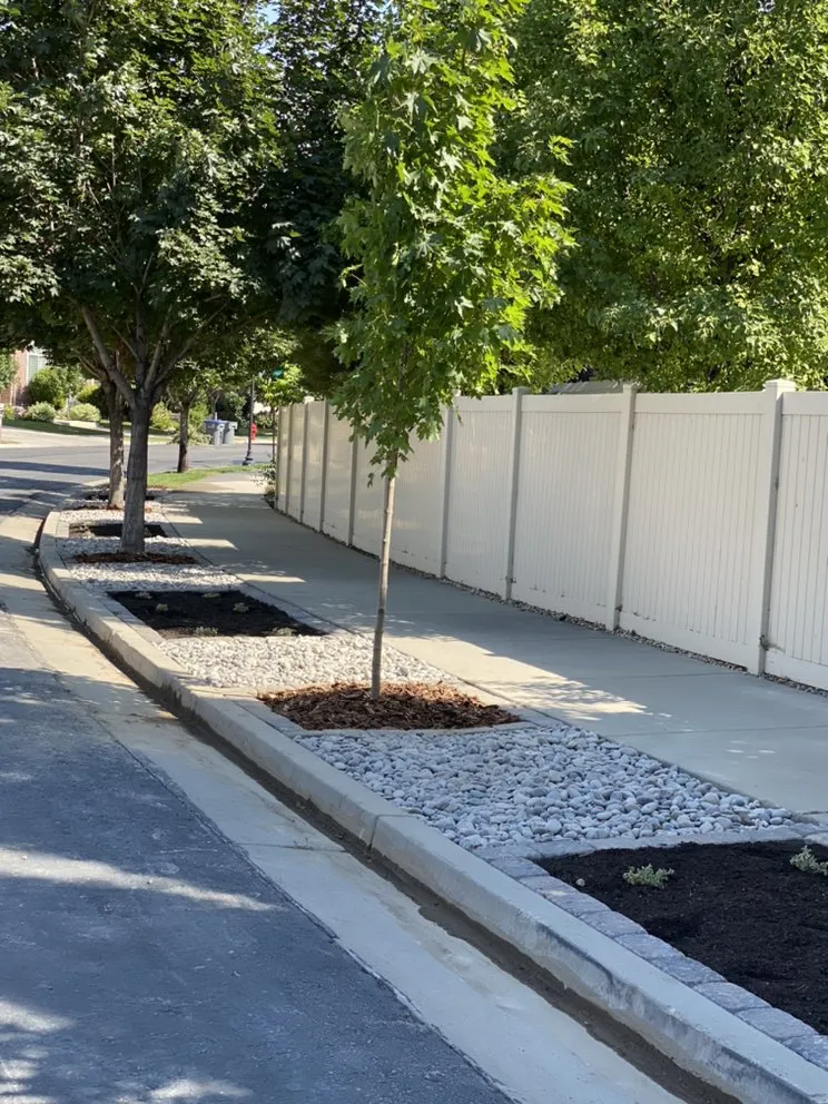 Reliable residential landscaping for beautiful yards in South Jordan, UT by Moliga Tree Specialists & Landscaping