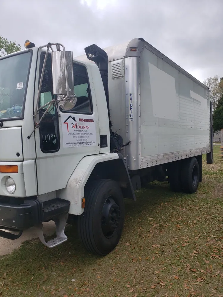 Custom residential landscaping in Foley, AL by Molina's Contructions, Landcaping & painting