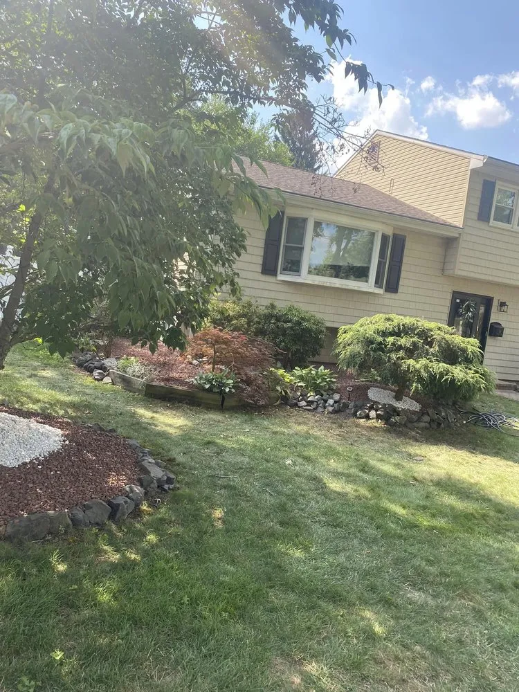 Custom lawn care service for year-round maintenance across Sayreville, NJ - Molteg Landscaping and Design