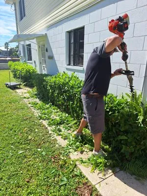 Monaco's Lawncare Logo