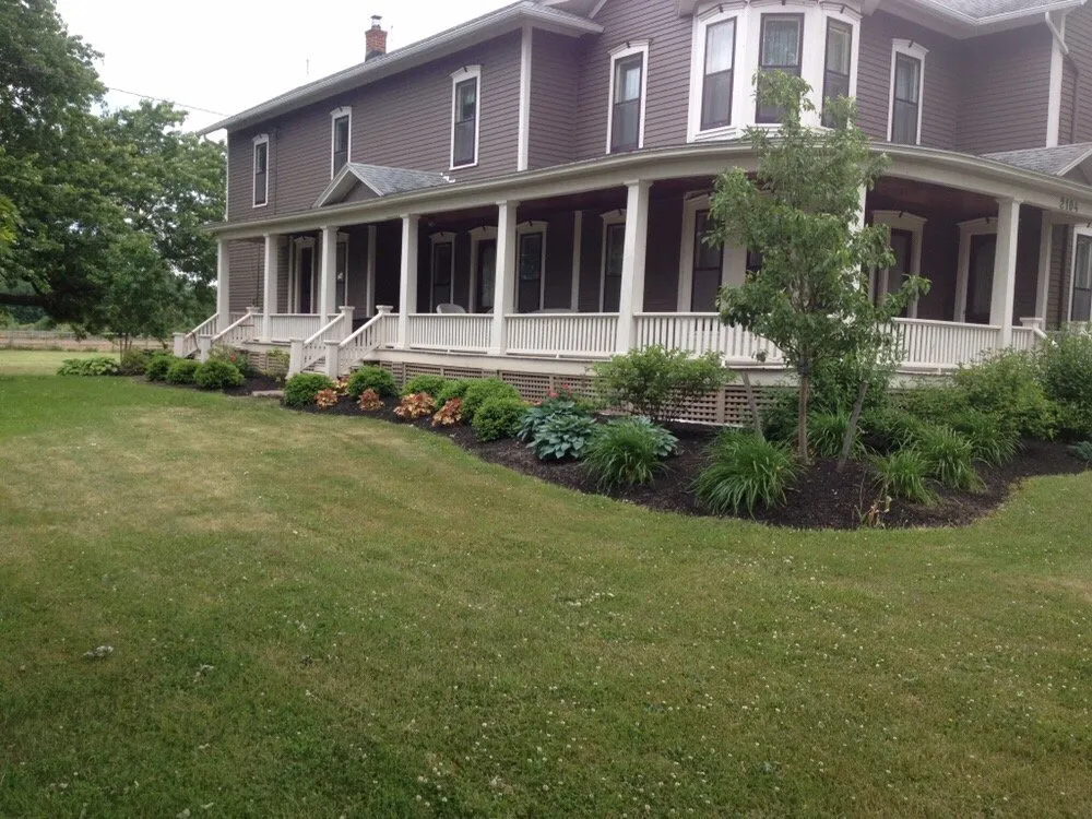 Custom residential landscaping in Brockport, NY by Monarch Lawn & Landscape