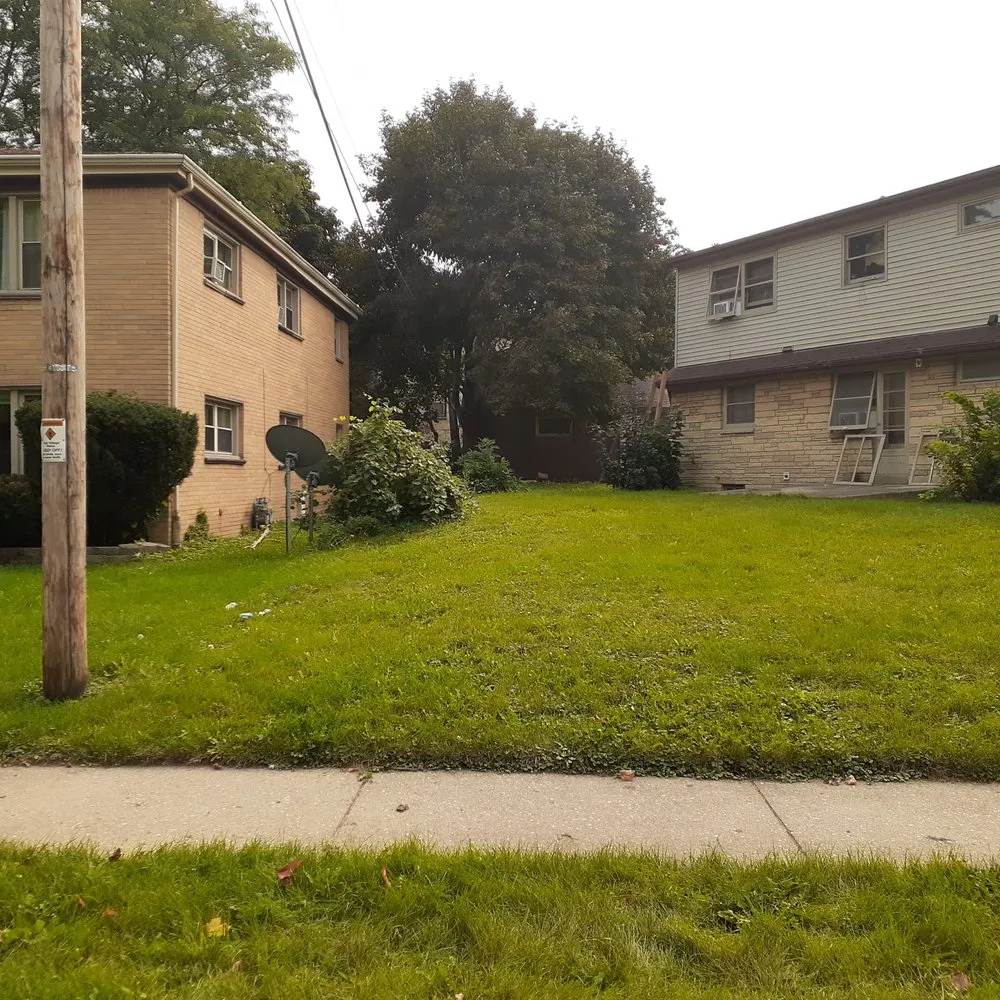 Professional landscaping services for residential properties in Milwaukee, WI by Mondo's Full Service Lawn Care