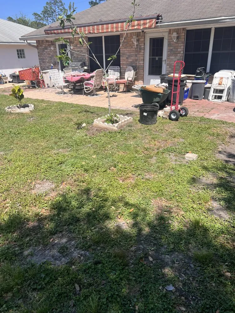 Trusted lawn care service for homes in Palm Coast, FL by Money J Lawn Care
