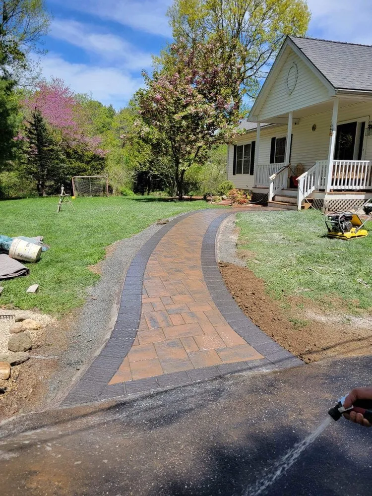 Professional landscape design for year-round maintenance across Clinton, MA - Monge's Landscape