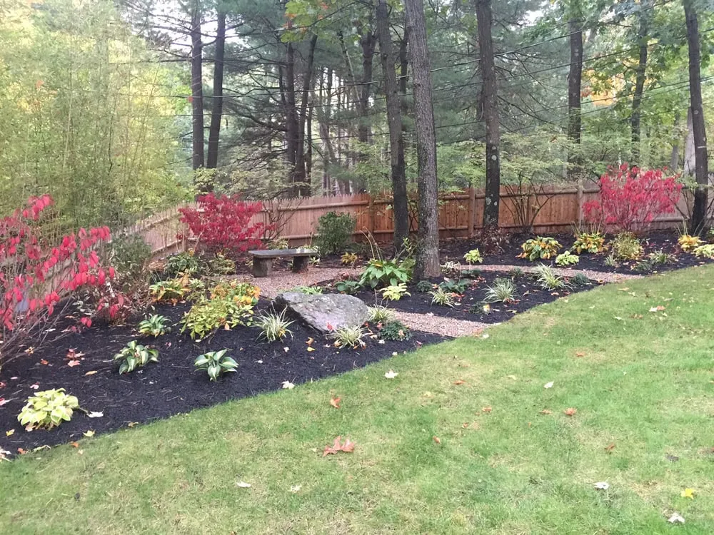Professional yard cleanup service for beautiful yards in Plainville, MA by Moniz Landscaping
