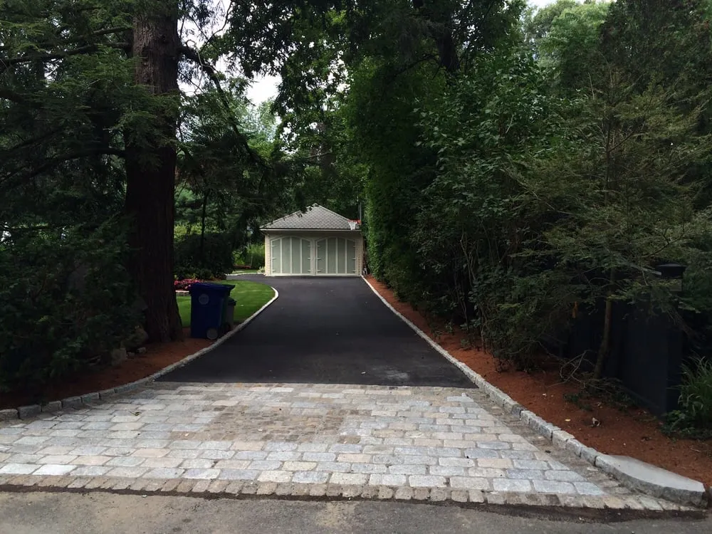 Affordable lawn care service for beautiful yards in Plainville, MA by Moniz Landscaping