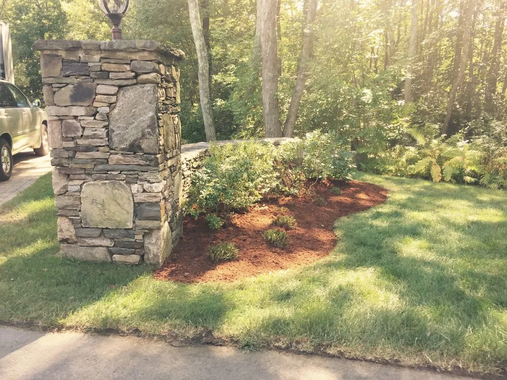 Top-rated lawn care service for residential properties in Framingham, MA by Monteiro And Sons Landscape Services