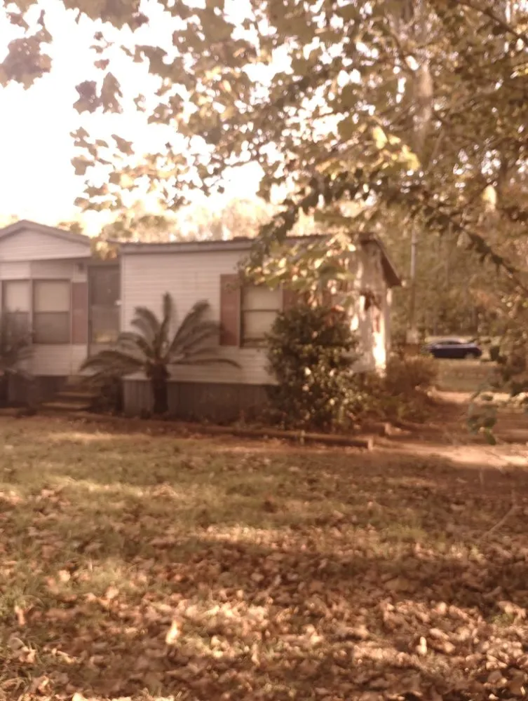 Professional outdoor landscaping for homes in Gainesville, FL by Monteocha Lawn Care Services