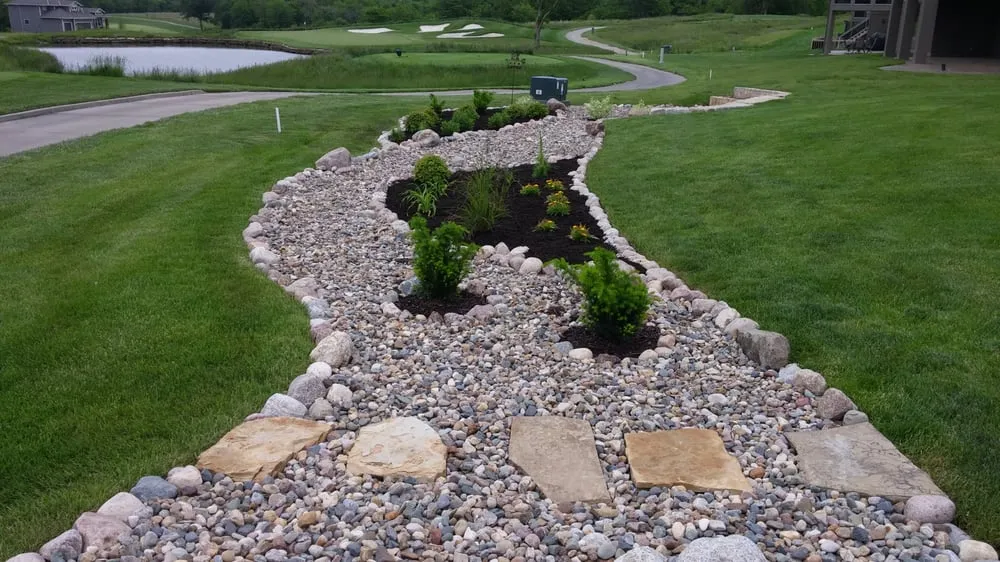 Professional garden landscaping in Raymore, MO by Monumental Outdoor