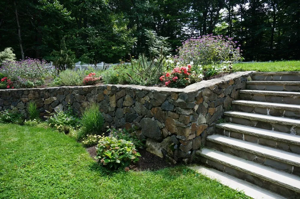Professional landscaping services for year-round maintenance in Arlington, MA by Moodscapes