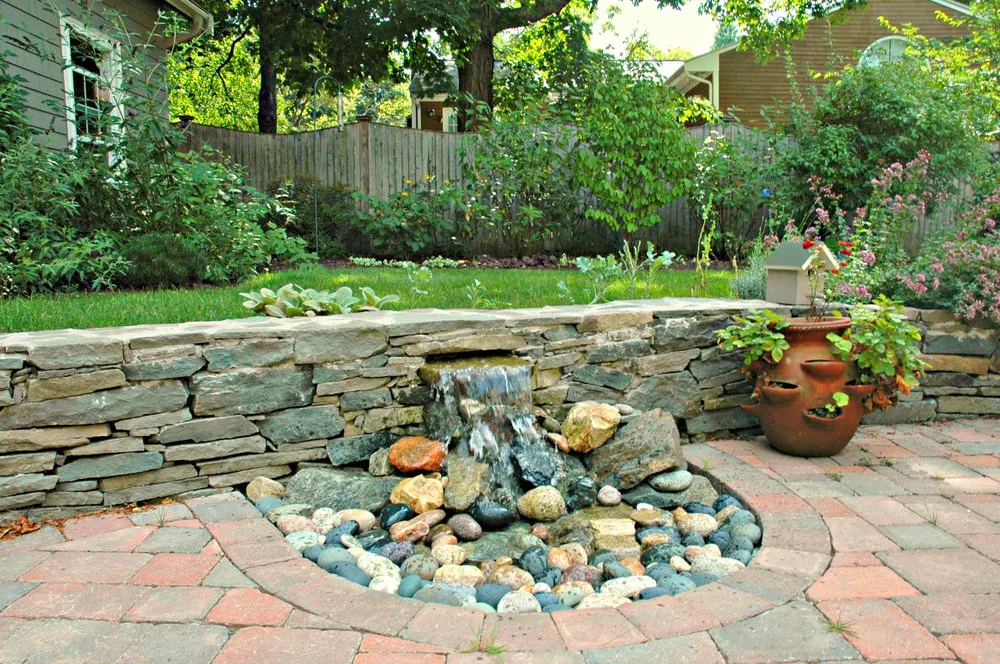 Reliable lawn mowing service with custom design in Arlington, MA by Moodscapes