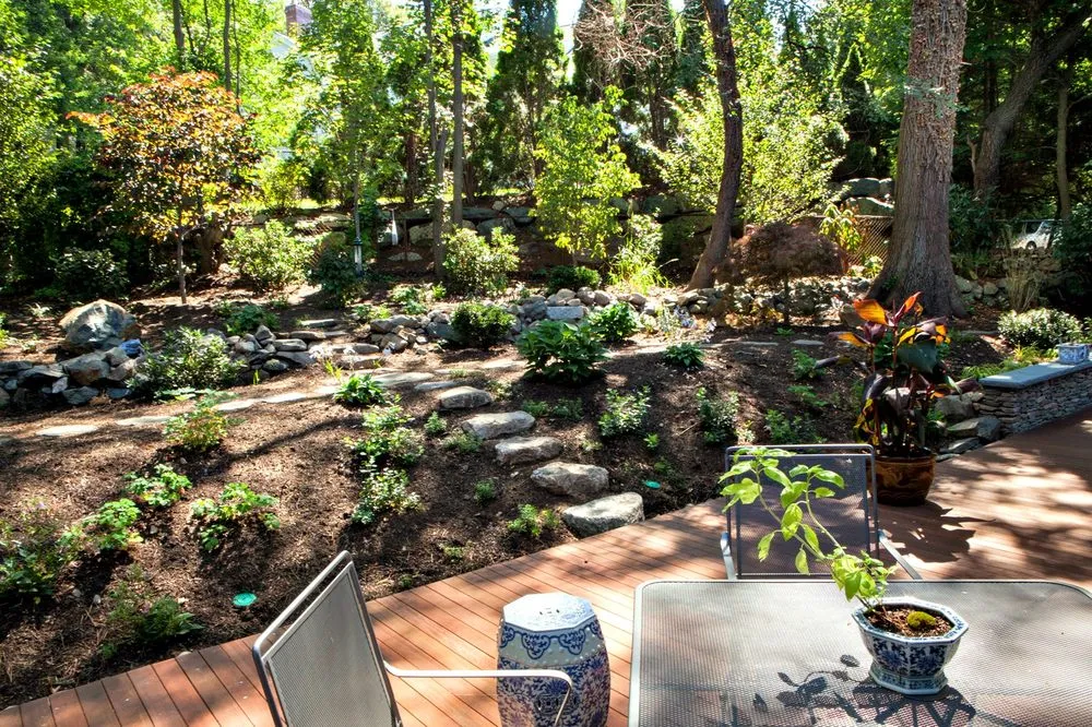 Affordable yard cleanup service for homes in Arlington, MA by Moodscapes