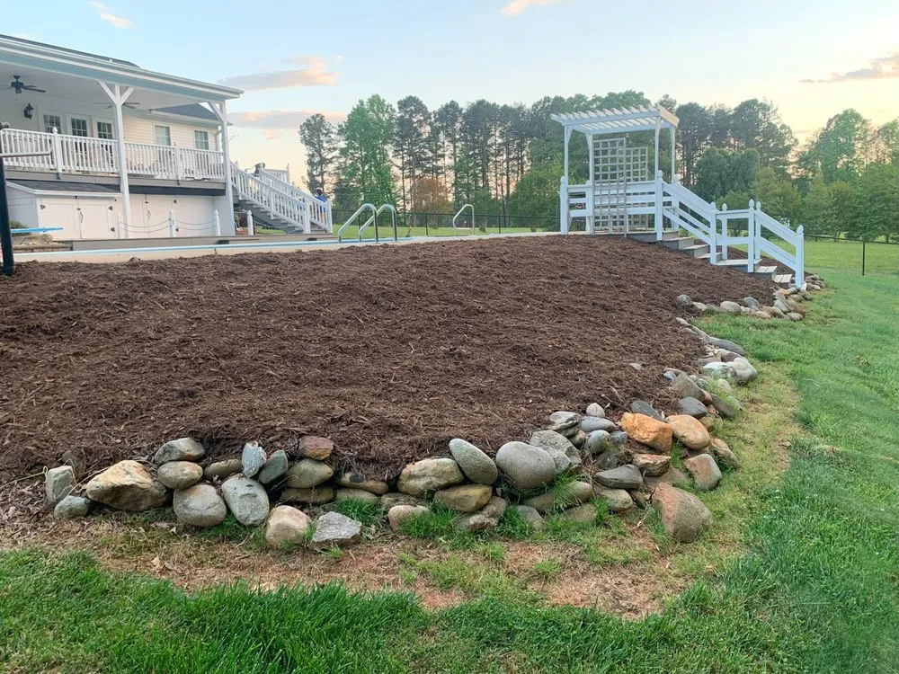 Affordable landscape installation for homes in Statesville, NC by Mooe's Landscaping & Pest Control