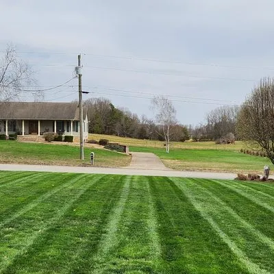 Moons Lawn Care Logo