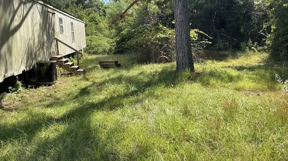 Custom landscape design in Gautier, MS by Moore & More Services