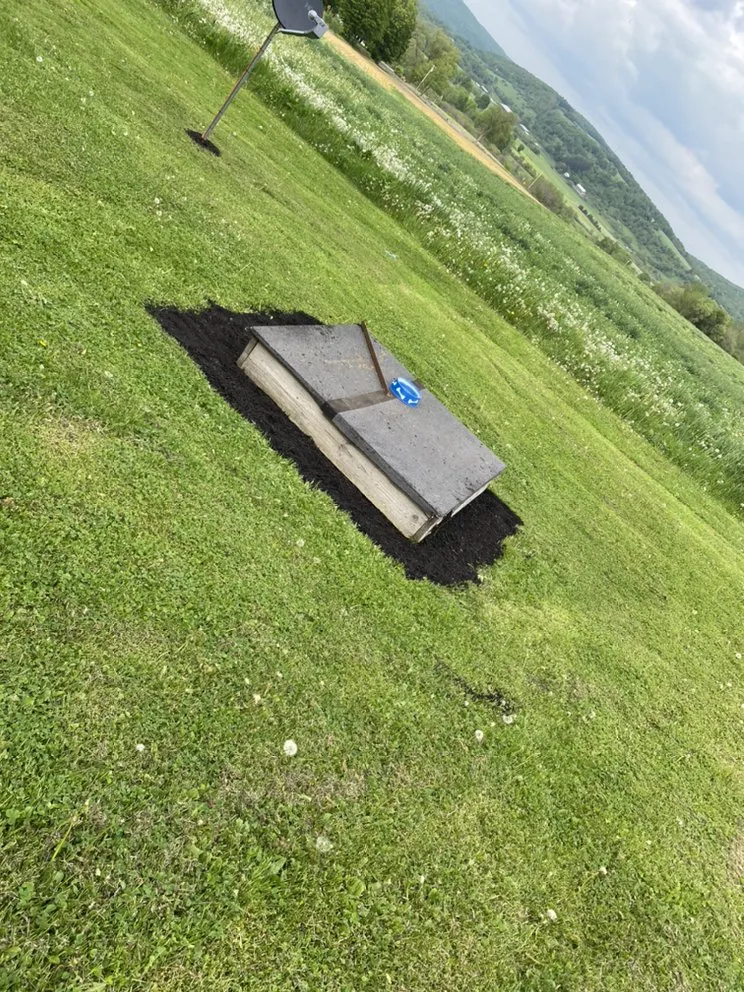 Top-rated landscape installation with custom design in Cortland, NY by Moore and Brown