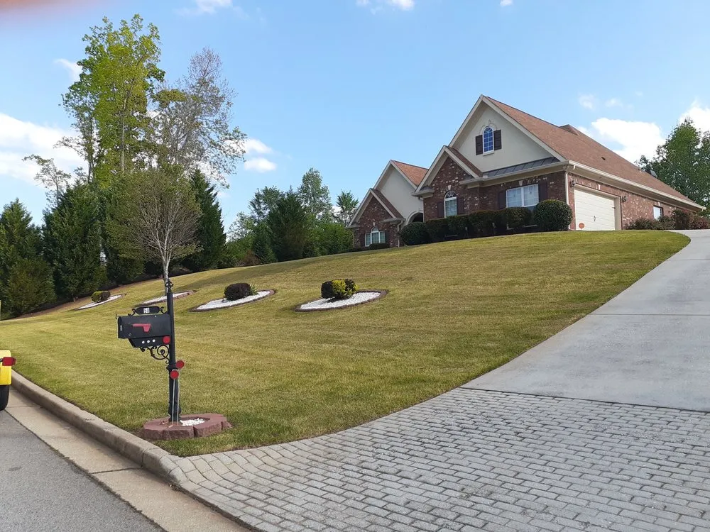 Trusted landscape installation for residential properties in Conyers, GA by Moore For Less Lawn Care