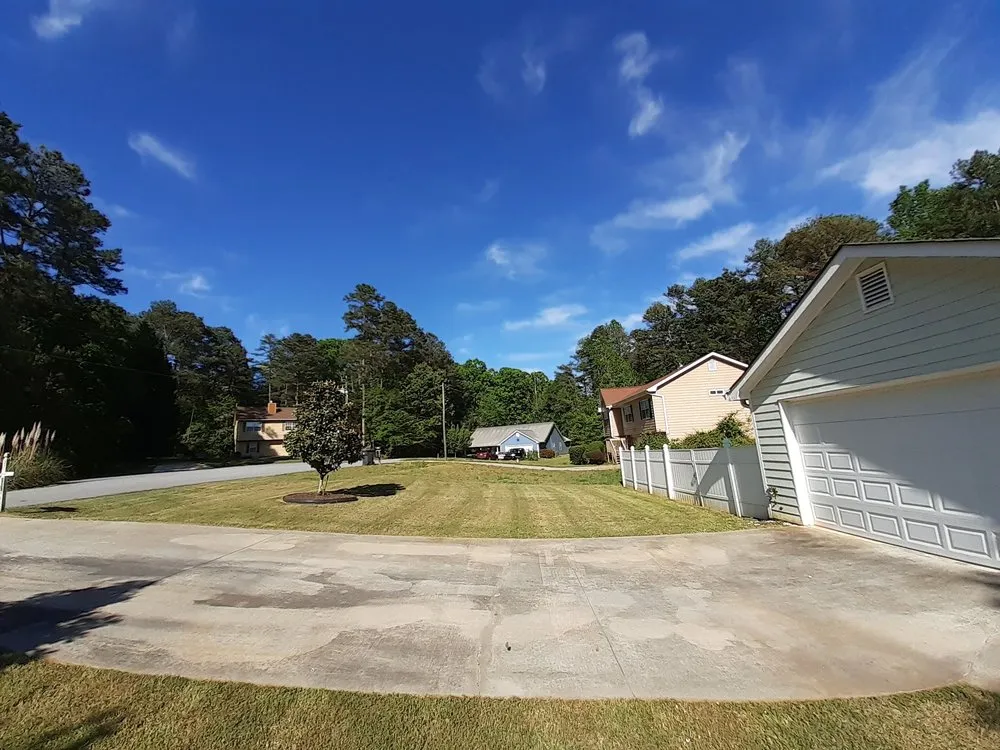 Affordable yard maintenance in Conyers, GA by Moore For Less Lawn Care