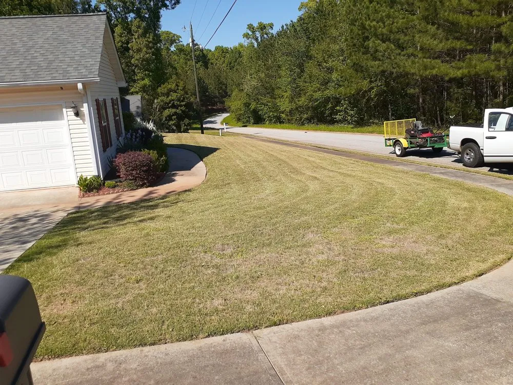 Top-rated yard maintenance for residential properties in Conyers, GA by Moore For Less Lawn Care
