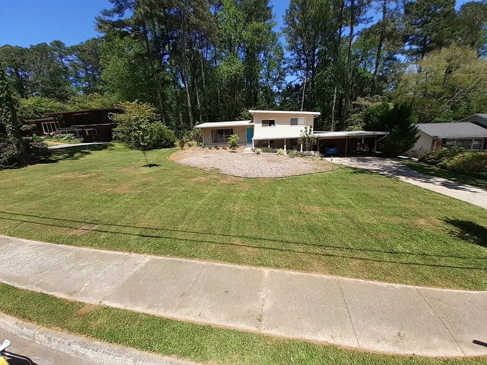 Custom landscape design experts serving Conyers, GA - Moore For Less Lawn Care