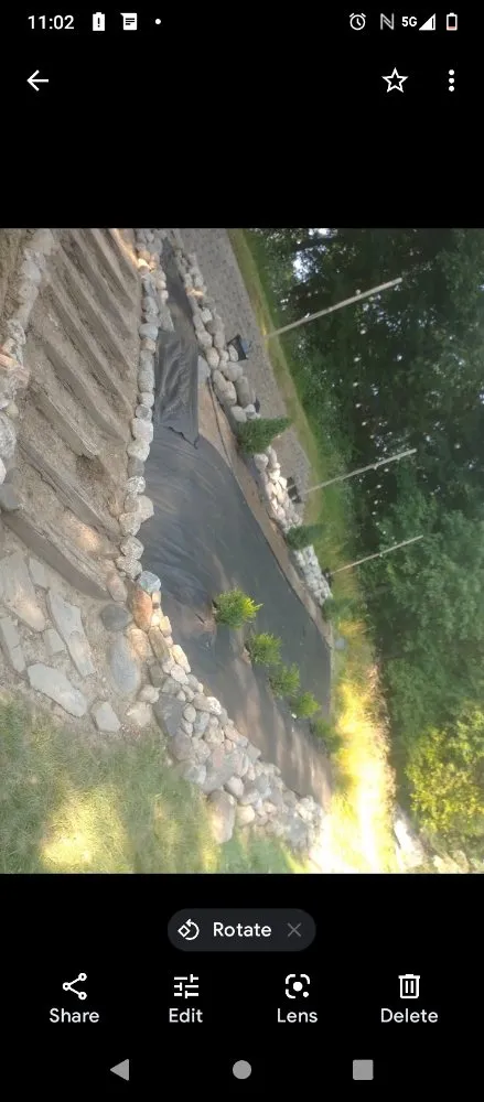 Professional yard cleanup service for homes in Brighton, MI by Moore Landscaping