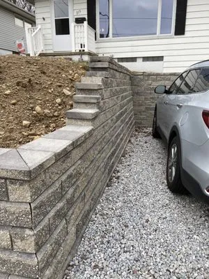 Moore’s Landscapes and Remodeling Logo