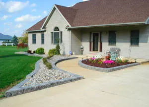 Affordable lawn mowing service for homes in Reading, MI by Moore's Landscaping