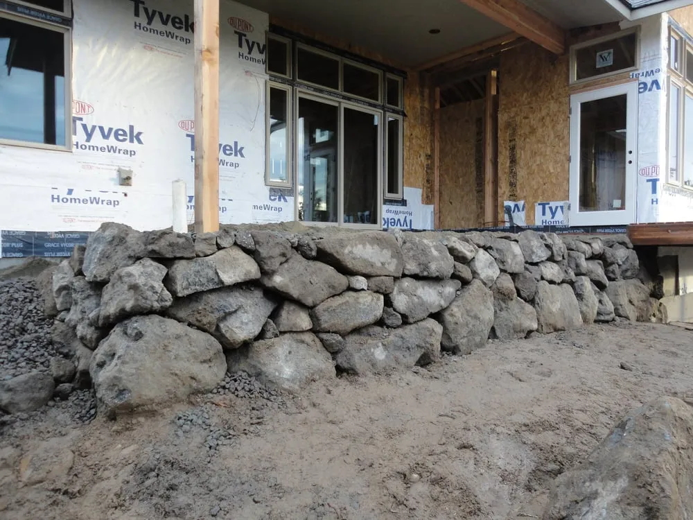 Custom landscape installation for homes in Indianola, WA by Moore's Works