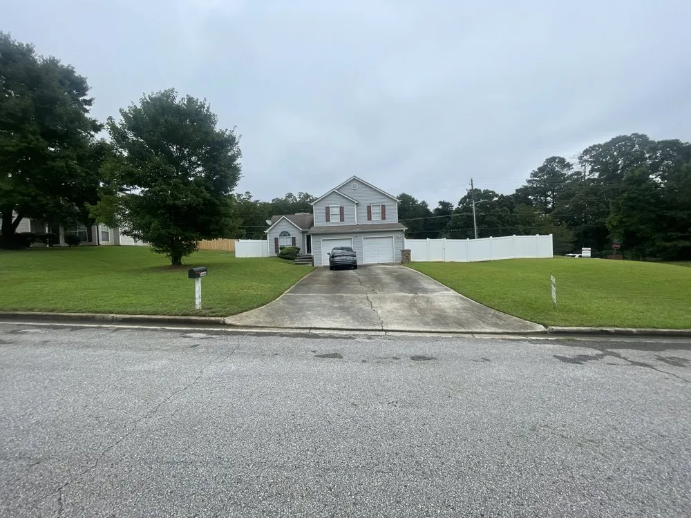 Professional outdoor landscaping for homes in Jonesboro, GA by Mopar Mowing