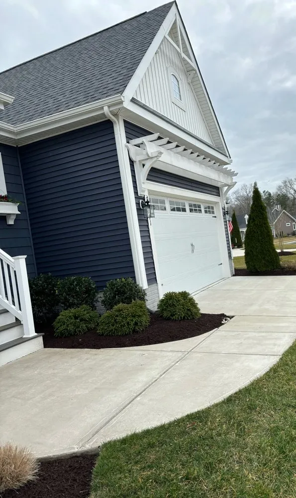Custom lawn mowing service for residential properties in Georgetown, DE by Morente landscaping