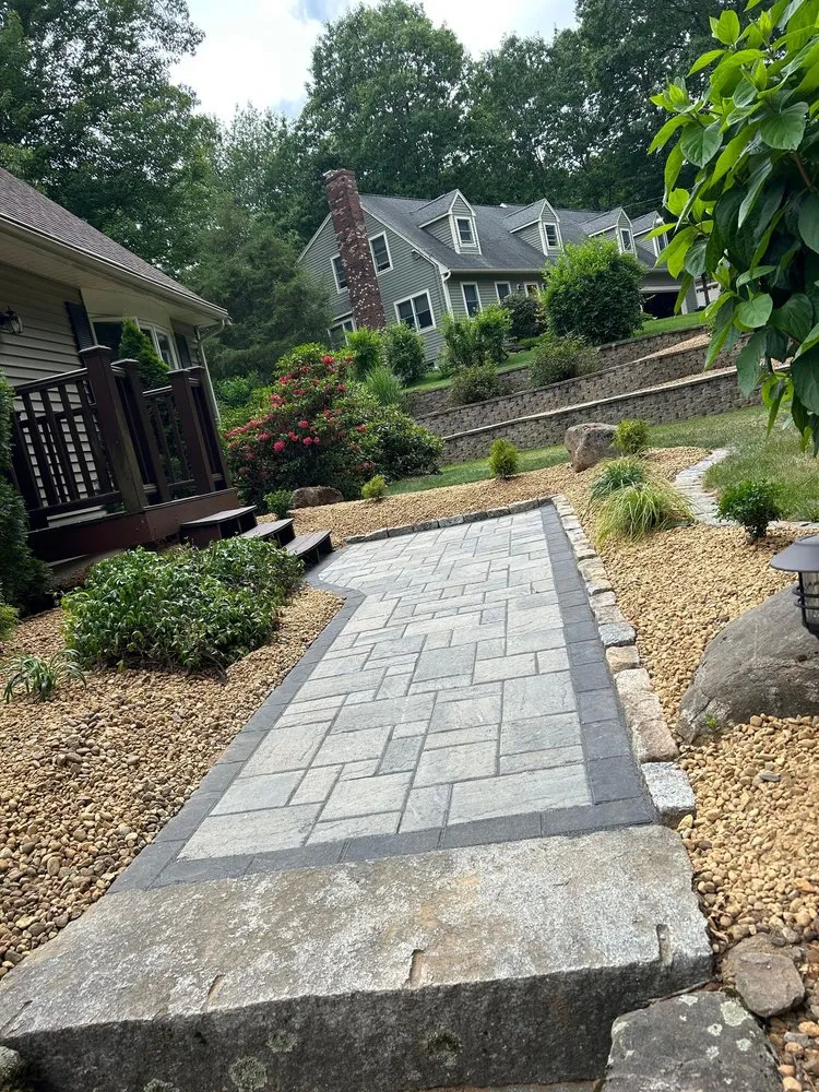 Expert lawn care service for homes in Oxford, MA by Morin's Landscaping